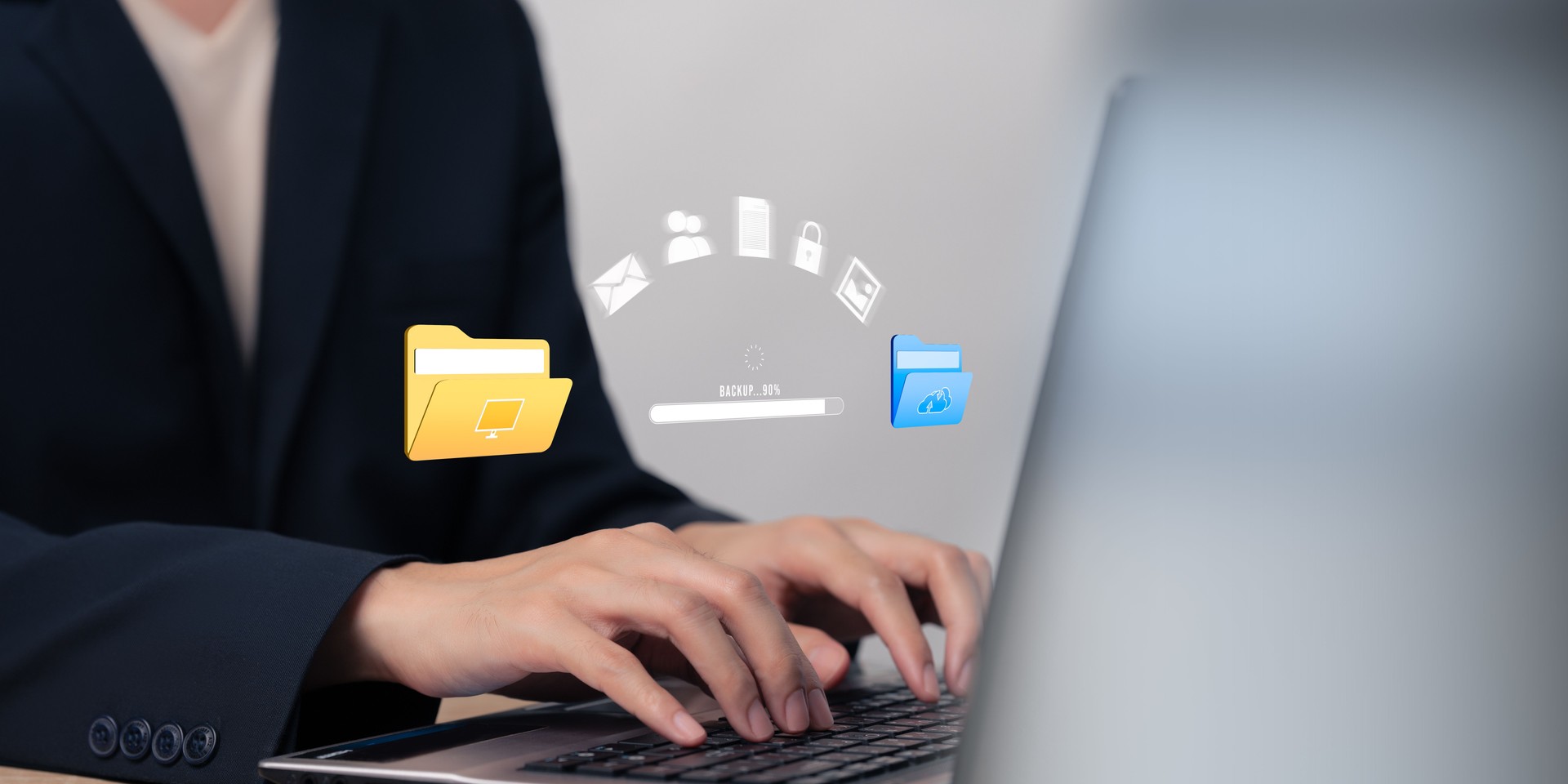 Businessman transferring backup business data to the cloud, Backup data to the cloud, Backing up data in multiple locations to prevent data loss.